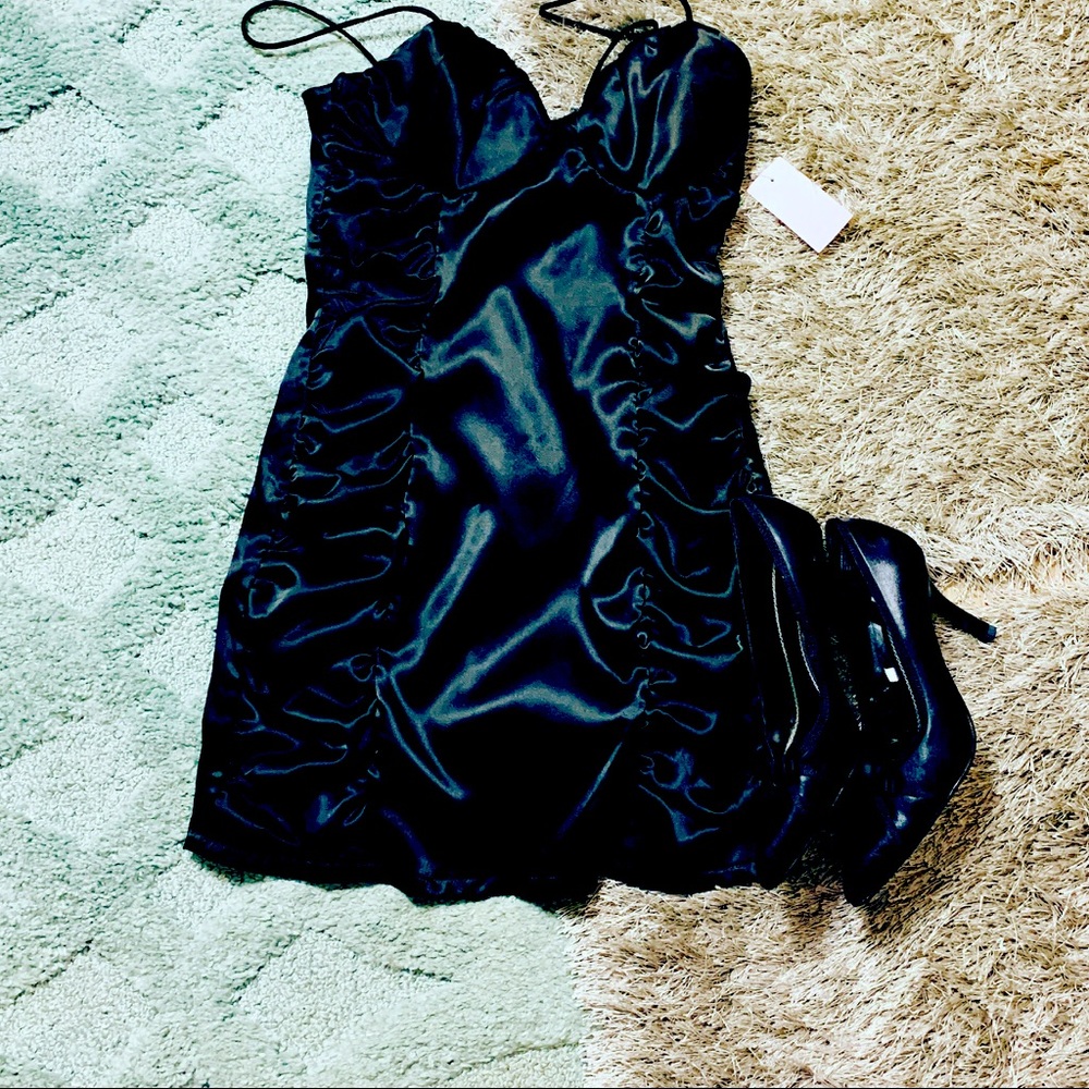 Little black corset dress and high heels